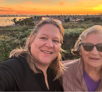 Sarah and her mom on a walk at the Back Bay in Newport Beach